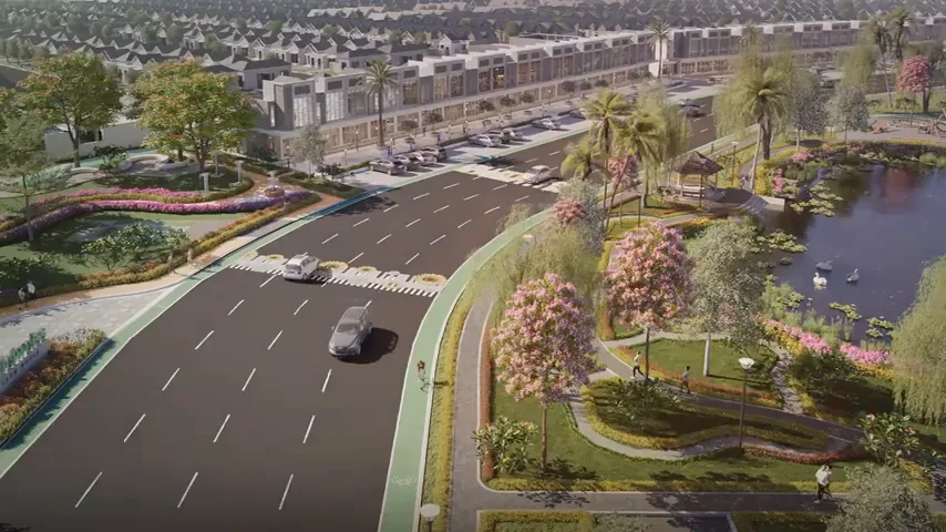 Boulevard Kota Podomoro Tenjo dengan jalur hijau dan danau